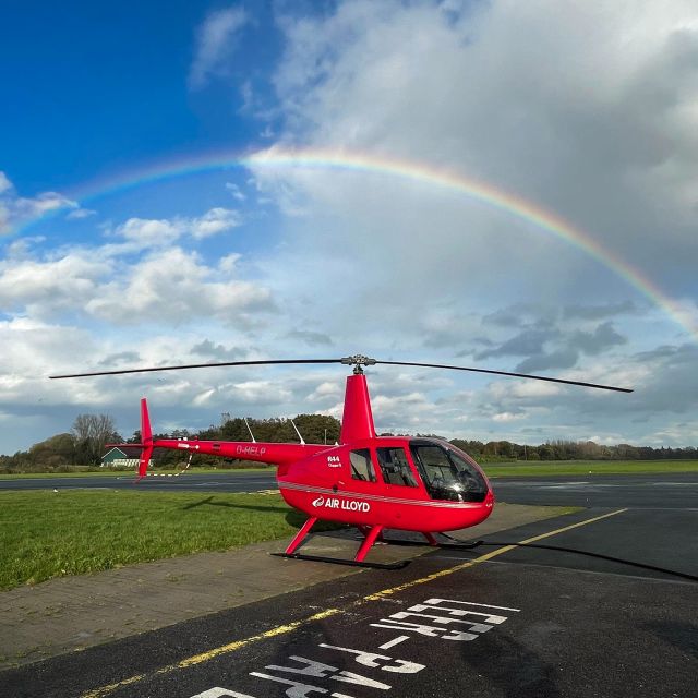 AIR LLOYD Flight Service - R44 Helikopter unter Regenbogen