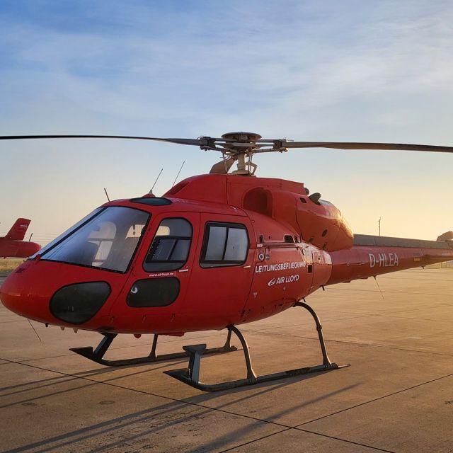 AIR LLOYD Flight Service - D-HLEA Helikopter im Sonnenuntergang